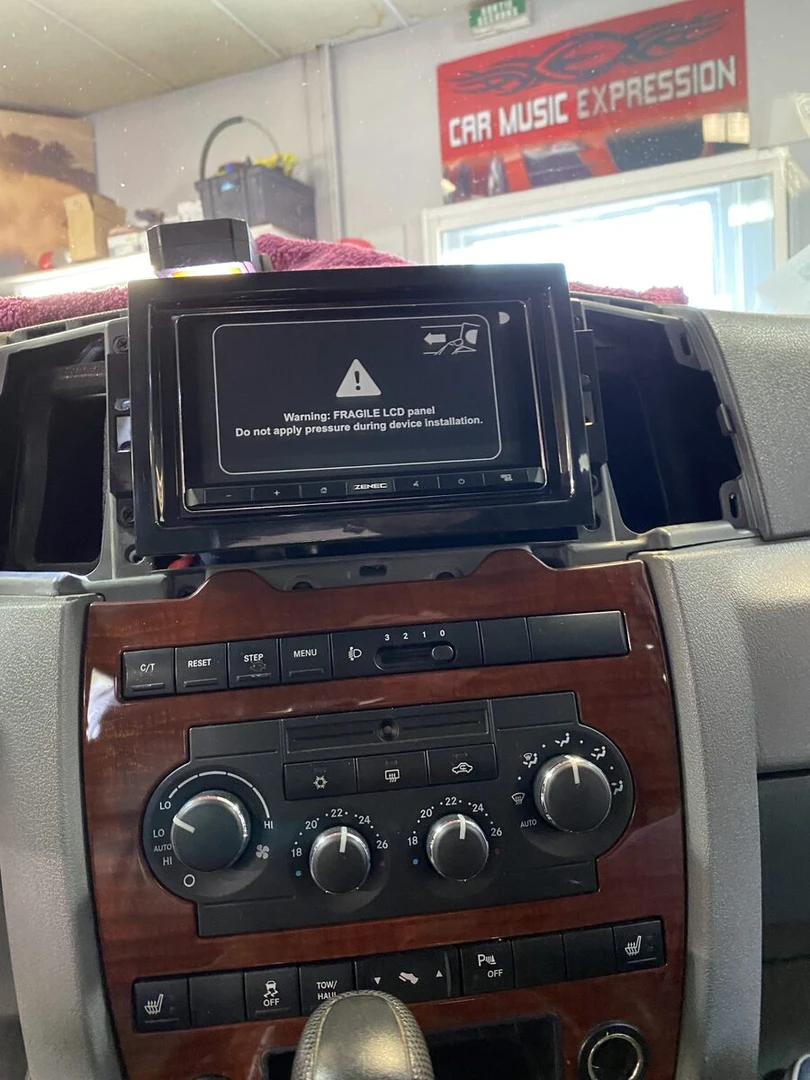 Jeep Grand Cherokee : autoradio CarPlay, caméra et système Harman Kardon conservé