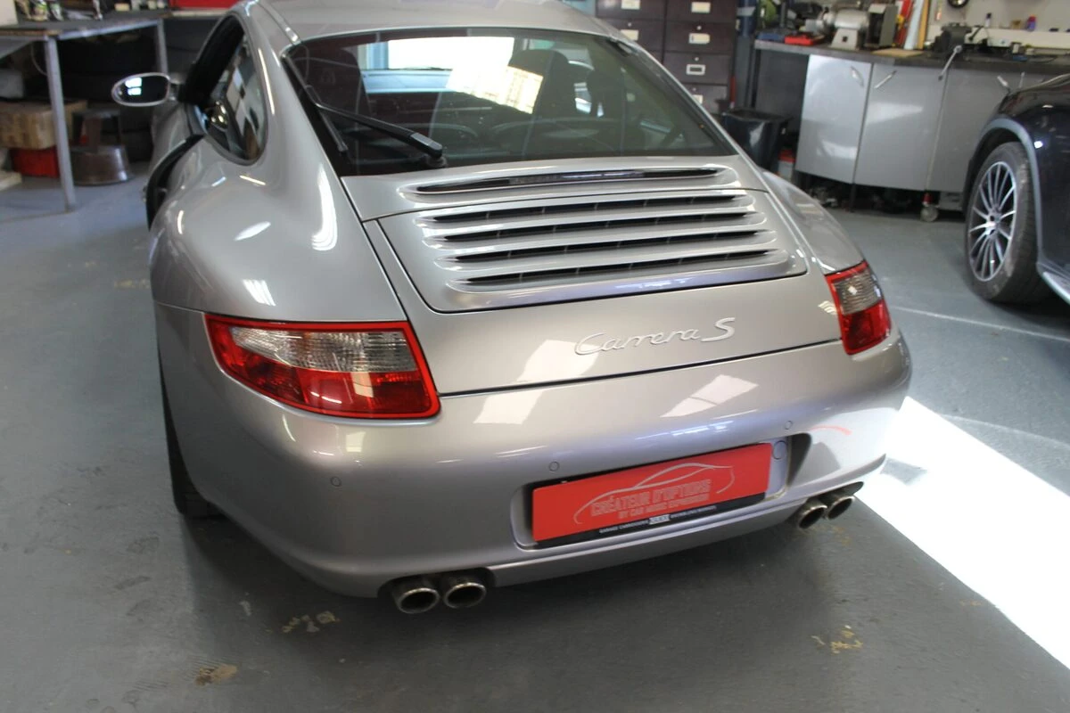 Porsche 997 Carrera S : autoradio GPS Kenwood DNX419DAB et caméra de recul