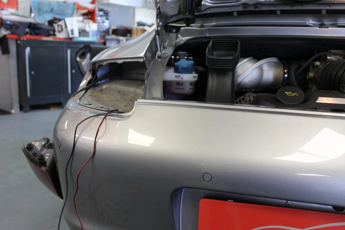 Porsche 997 Carrera S : autoradio GPS Kenwood DNX419DAB et caméra de recul