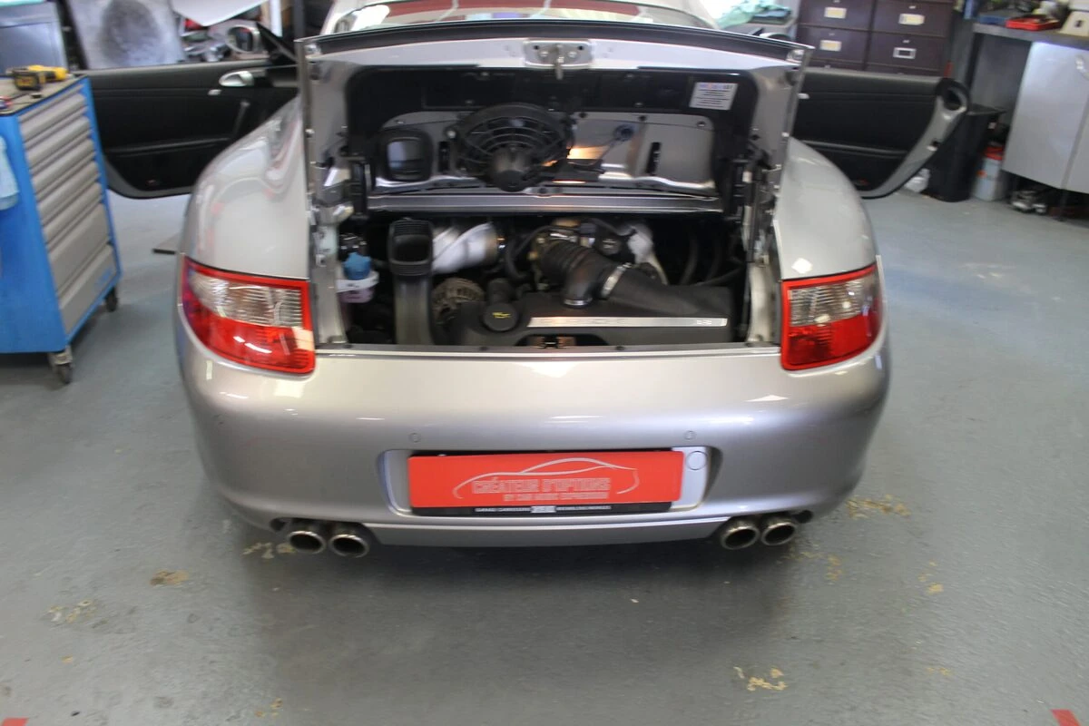 Porsche 997 Carrera S : autoradio GPS Kenwood DNX419DAB et caméra de recul