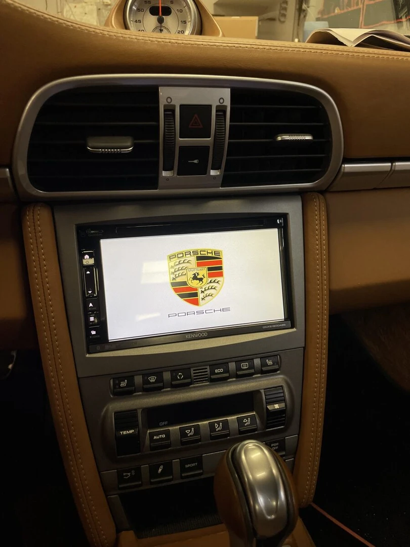 Porsche 997 Turbo : Kenwood DNX5190DABS et bouton de clim remplacé