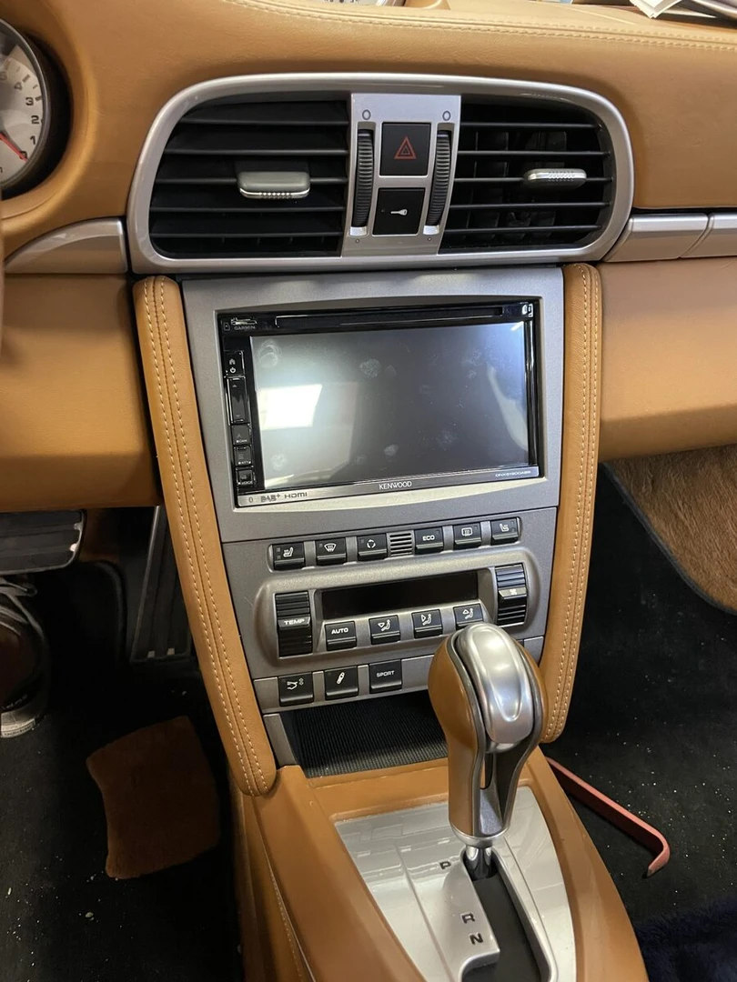 Porsche 997 Turbo : Kenwood DNX5190DABS et bouton de clim remplacé