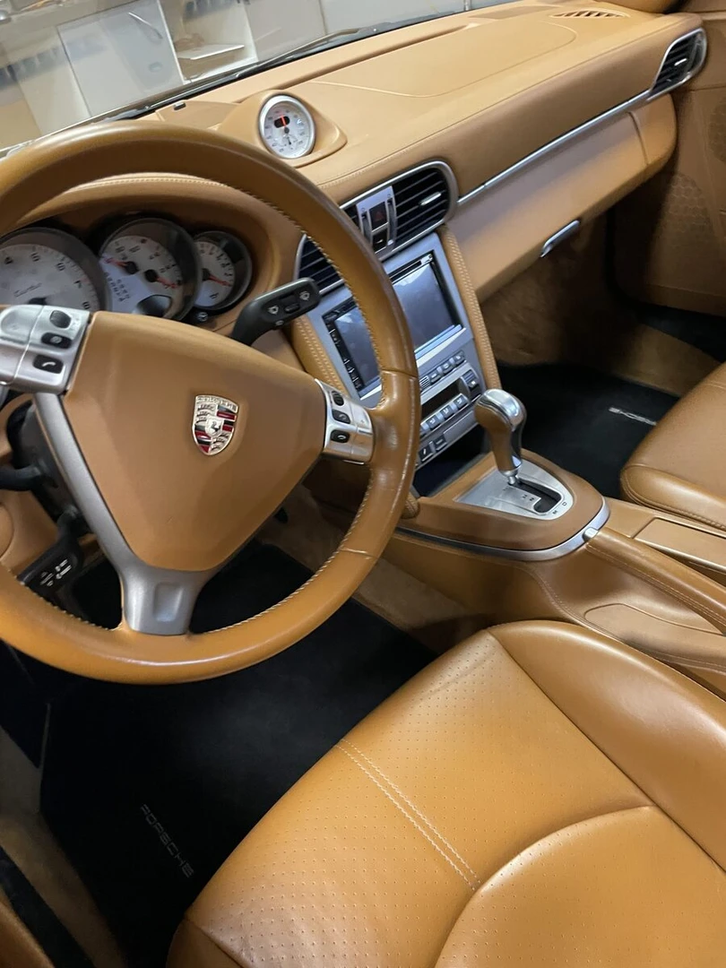 Porsche 997 Turbo : Kenwood DNX5190DABS et bouton de clim remplacé