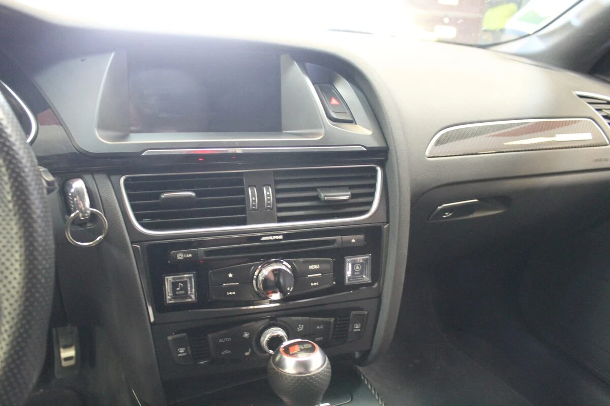 Audi RS4 : Alpine X703D-A4 avec ampli Bose conservé
