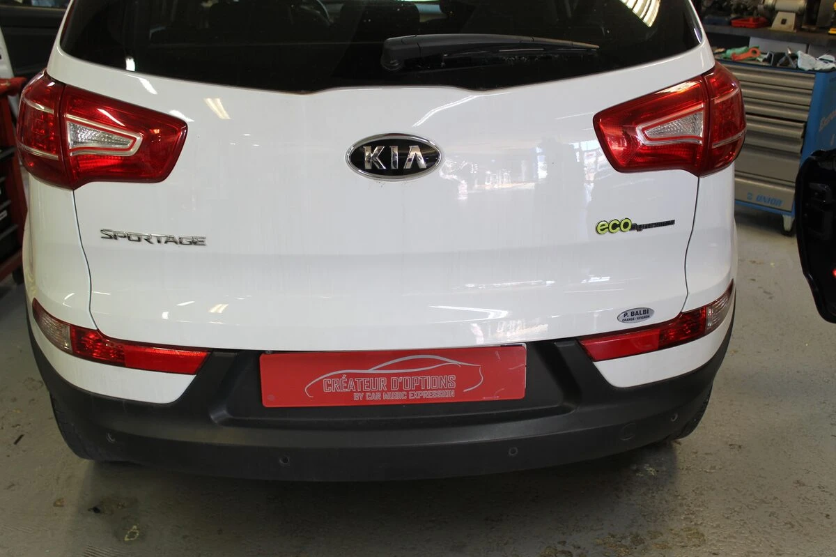 Kia Sportage : GPS Pioneer avec commandes au volant conservées