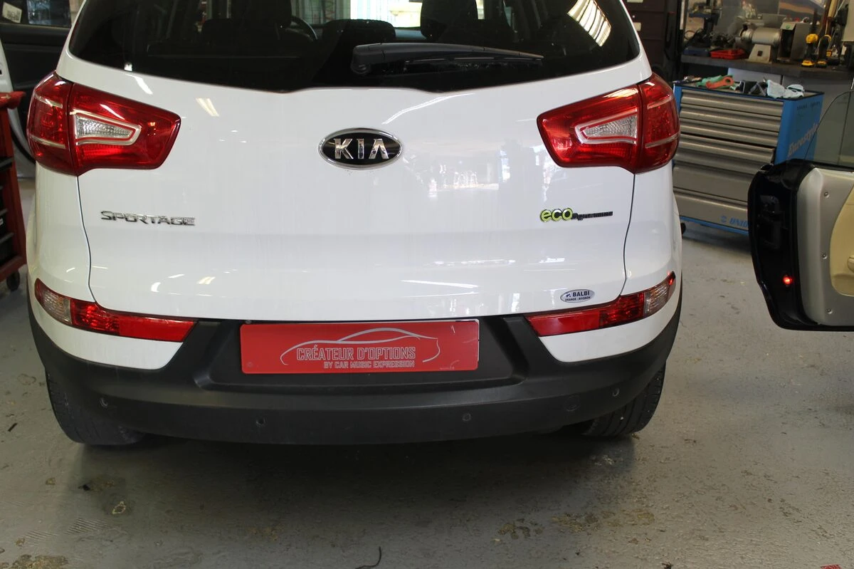 Kia Sportage : GPS Pioneer avec commandes au volant conservées