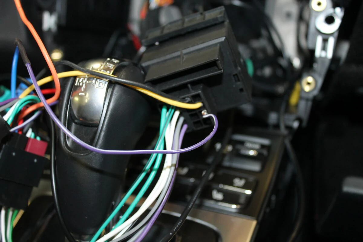 Porsche Boxster : Kenwood DNX419DABS et amplification d'origine conservée
