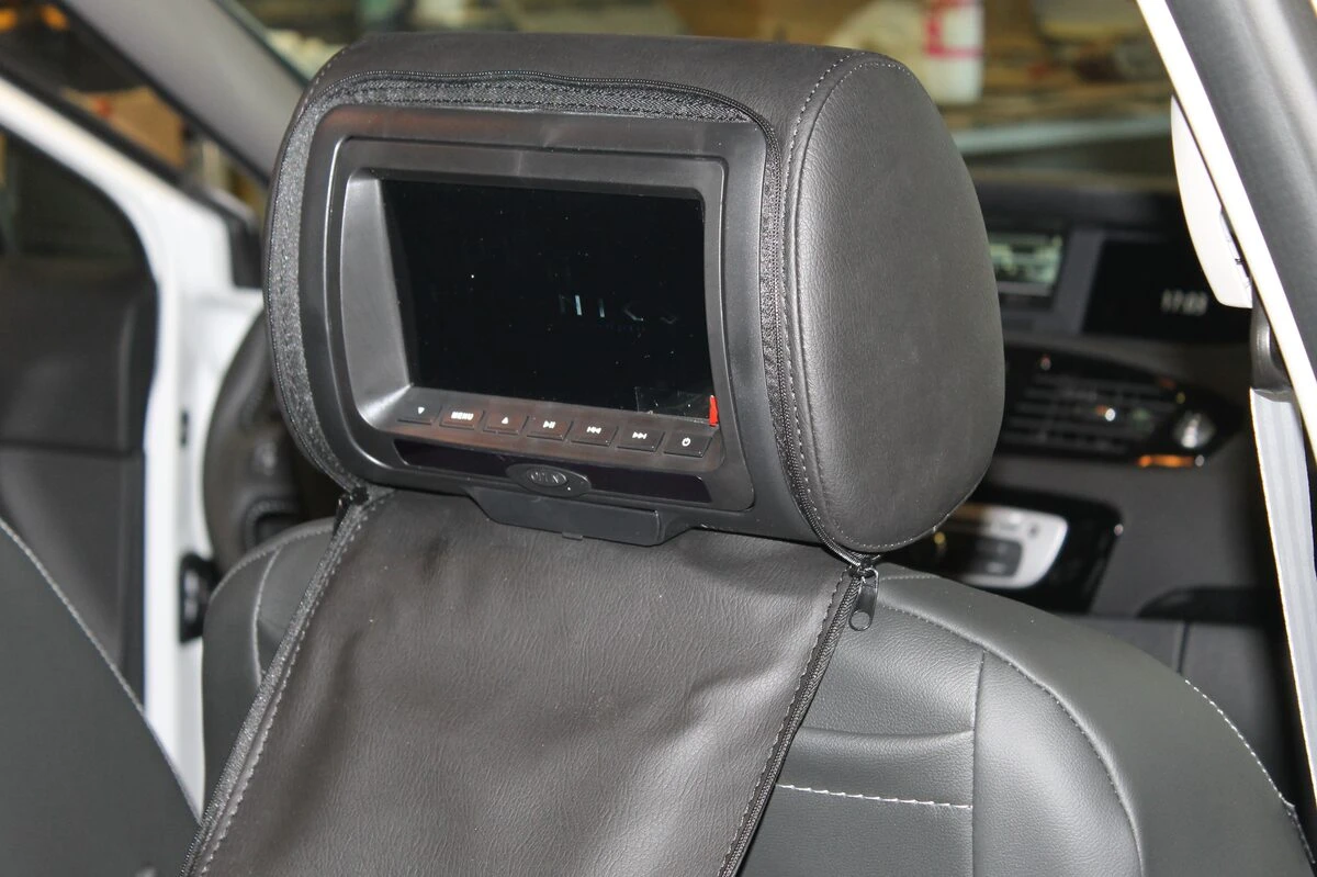 Renault Scénic : appuie-têtes DVD pour les passagers arrière