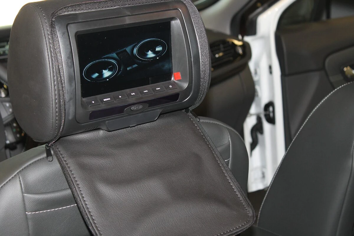 Renault Scénic : appuie-têtes DVD pour les passagers arrière