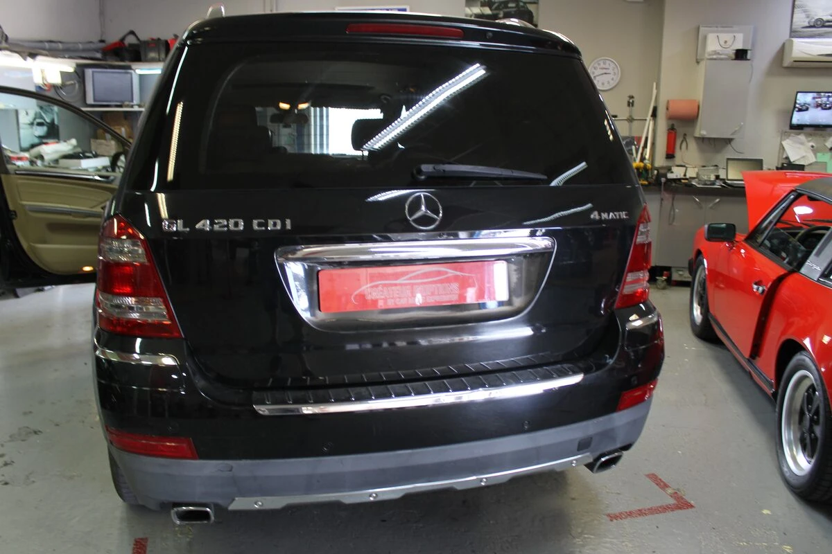 Mercedes GL : autoradio GPS Android avec sono Harman Kardon conservée