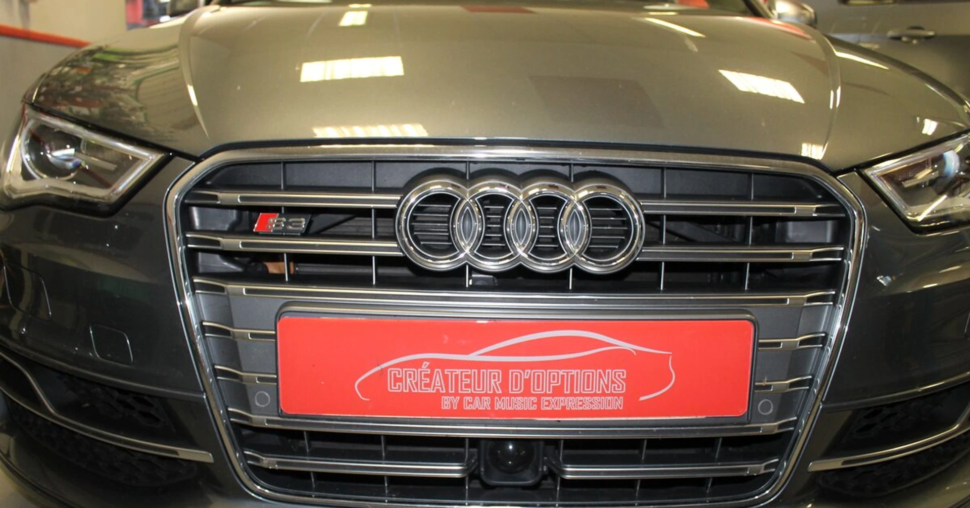 Audi S3 2014 : caméra de recul dans la poignée de coffre
