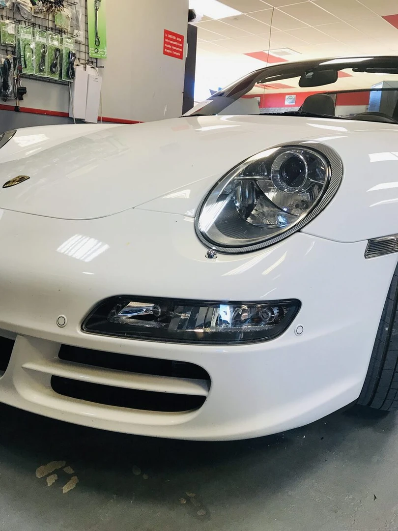 Porsche Panamera : CarPlay Kenwood avec Bose et caméra d'origine conservés